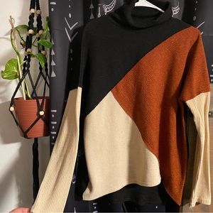 Amoli Women Large Color block top.black/burnt orange/cream